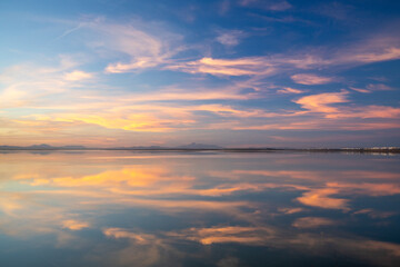 End of the day on a lake, sunset and light in the clouds- Tunisia