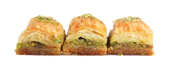 Delicious fresh baklava with chopped nuts isolated on white. Eastern sweets