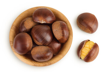 roasted peeled chestnut in wooden bowl isolated on white background wit full depth of field. Top view. Flat lay