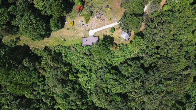 Aerial drone fly near Kew Fin viewpoint, Thailand. View of deep forest, mountains and hills in jungle. Cloudy weather.