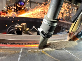 Submerged arc welding. Concept of robotized and automated welding.