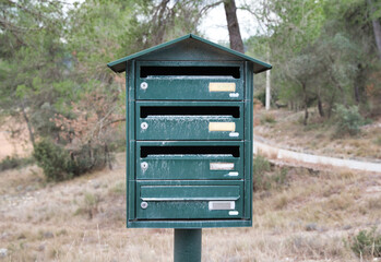 Mailbox in rural Spain A green mailbox quiet rural road.
