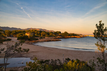 The Costa Daurada of L'Ametlla de Mar on the coast of Tarragona, Spain. Sant Jordi beach at sunset.