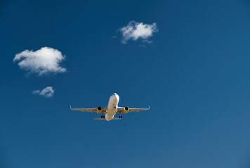 Passenger airplane, flying in the blue sky