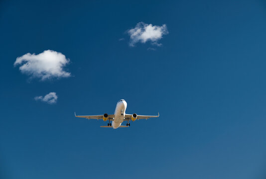 Passenger airplane, flying in the blue sky © Michael