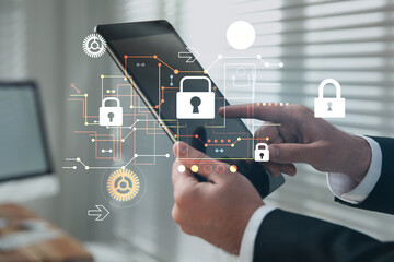 Privacy protection. Man using tablet in office, closeup. Digital scheme with padlocks over device