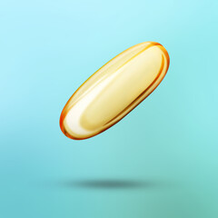 Vitamin capsule in air on light blue background