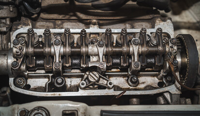 Close up of parts of a car engine head. Cylinder heads. Valve springs. Engine block.