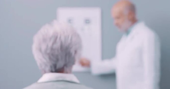 Senior woman having a professional eye test