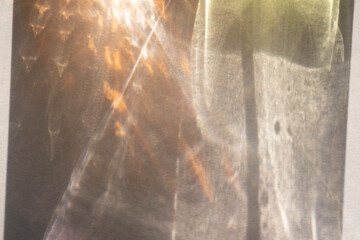 Abstract yellow gold caustic strobe prism texture overlay. Summer copy paste background