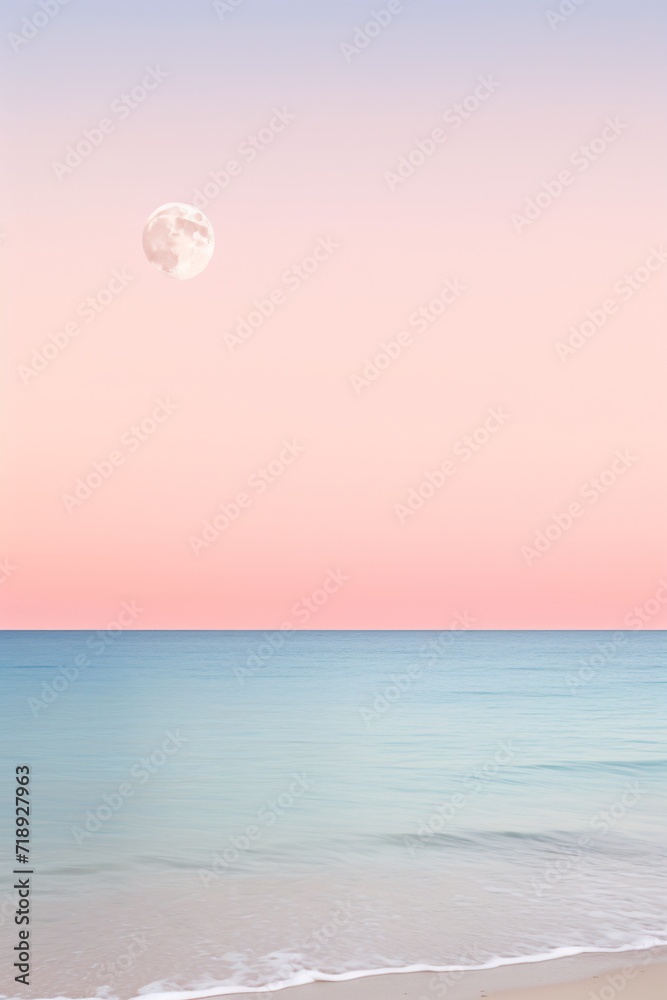 Wall mural the moon hovering over the ocean at sunset on the beach