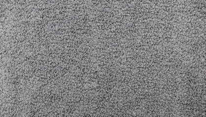 Obraz premium Close-up of grey monochrome carpet texture background for interior flooring material. office carpet background.