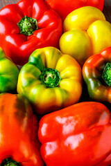Colorful bell peppers.Close up of assorted red and yellow bell peppers(bell pepper,capcicum). Also known as Sweet pepper, Pepper or Capsicum.top view