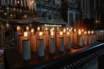 Napoli, Italy - 06 29 2023: Bulb candles of the Gesu Nuovo Church, a 16th-century Neopolitan...