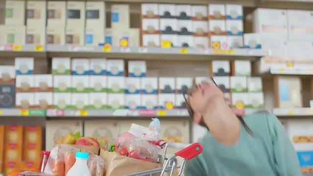 Woman checks an expensive shopping receipt and faints