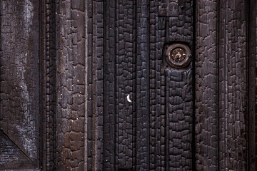 Burnt door lock in the old town of Villajoyosa