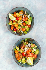 Vegetable salad with seafood.
