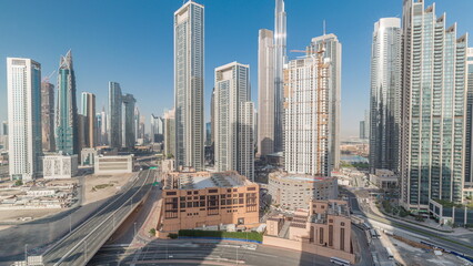 Naklejka na ściany i meble Aerial view of Dubai Downtown skyline with many towers timelapse.