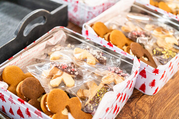 Festive Christmas Tin Boxes Filled with Chocolate-Dipped Treats