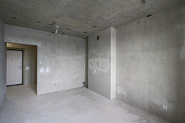 Obraz premium rough repairs for self-finishing. interior decoration, bare walls of the room, stage of construction. interior apartment room