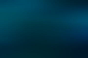 A dark blue soft focus plain abstract background with copyspace