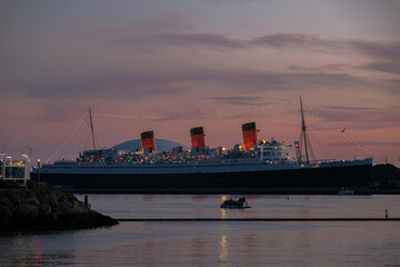 World famous tourist destination and historic ocean liner cruiseship cruise museum ship hotel in port of Long Beach, California USA