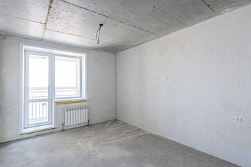 rough repairs for self-finishing. interior decoration, bare walls of the room, stage of construction. interior apartment room