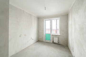 rough repairs for self-finishing. interior decoration, bare walls of the room, stage of construction. interior apartment room