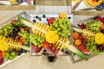 Eating at the event. Luxurious Fruit Platter Presentation. Top View