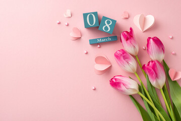 Celebrate love and grace on Woman's Day with vibrant display. Top view of tulips, hearts, and calendar set to 8th March on pastel pink backdrop, offering space for heartfelt message or advertisement