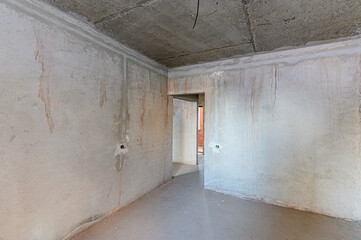 Obraz premium rough repairs for self-finishing. interior decoration, bare walls of the room, stage of construction. interior apartment room