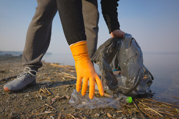 Garbage collection on the beach. Ecology concept. Close-up view.