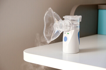 Oxygen mask of nebulizer with steam, medical equipment for pneumonia, covid, sars and bronchitis...