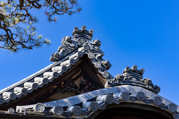 Roof with beautiful traditional Japanese onigawara tiles.