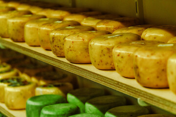 Traditional Dutch cheese displayed for sale