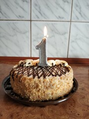Cake with a number one candle