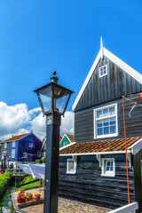Dutch village scene with wooden houses on the island of Marken in the Netherlands.
