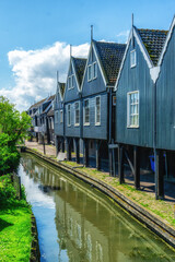 Fototapeta na wymiar Marken, a fishing village with traditional wooden houses, located in the North of Amsterdam, North Holland, Netherlands