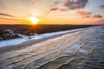 Winter sunset over the Baltic Sea in Jantar, Poland