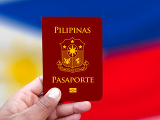 philippines passport holding in hand