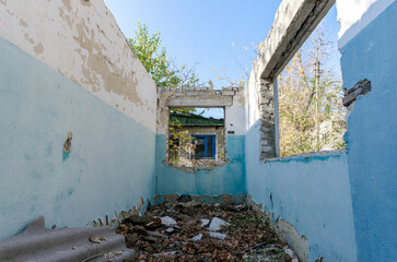 ruins of an old abandoned village house in Ukraine
