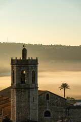 Church tower and village building at Lliber, Costa Blanca, Marina Alta, Alicante province, Spain - stock photo