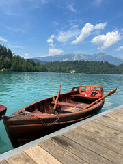 Boat in the blue clear water and bright sky summer at the Lake Bled, Slovenia