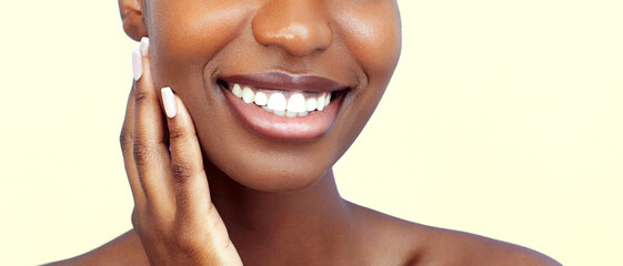 Dental care beauty portrait. African american young woman with clean and bright skin and white...