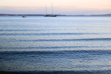 Obraz premium Bright blue sea and clear sky. Copy space.