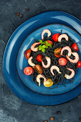 Vegan black spaghetti with shrimp.