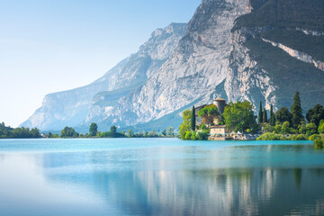Lake Toblino and Castel Toblino and reflection. Madruzzo, Trento, Italy
