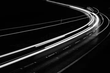 Papier Peint photo Autoroute dans la nuit white lines of car lights on black background