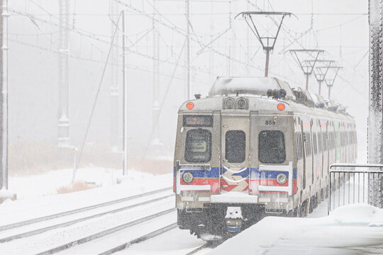 Claymont, DE USA 1-19-2024 - Set of SEPTA Silverliner Vs departing from Claymont statin during a snowstorm