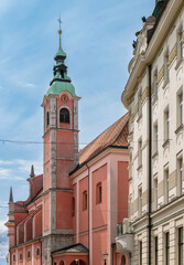 Franciscan Church of the Annunciation (Frančiškanska cerkev Marijinega oznanjenja) from the historic center street Miklošičeva Cesta towards Prešernov Trg square, Ljubljana, Slovenia
